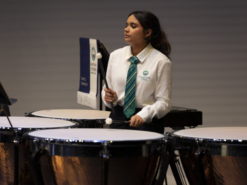 Flinders Music Scholar plays drum